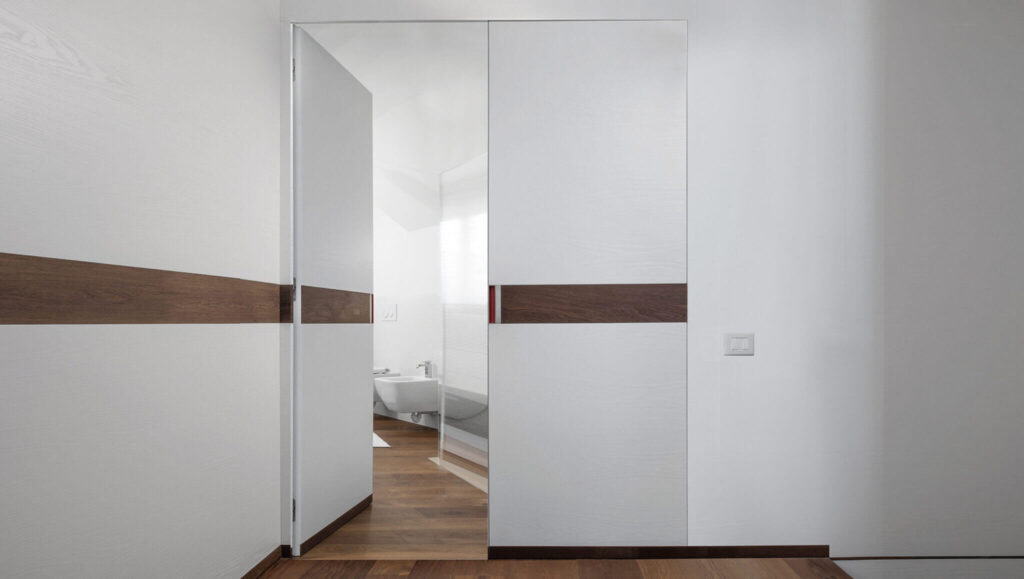 Porte a battenti in legno ECLISSE